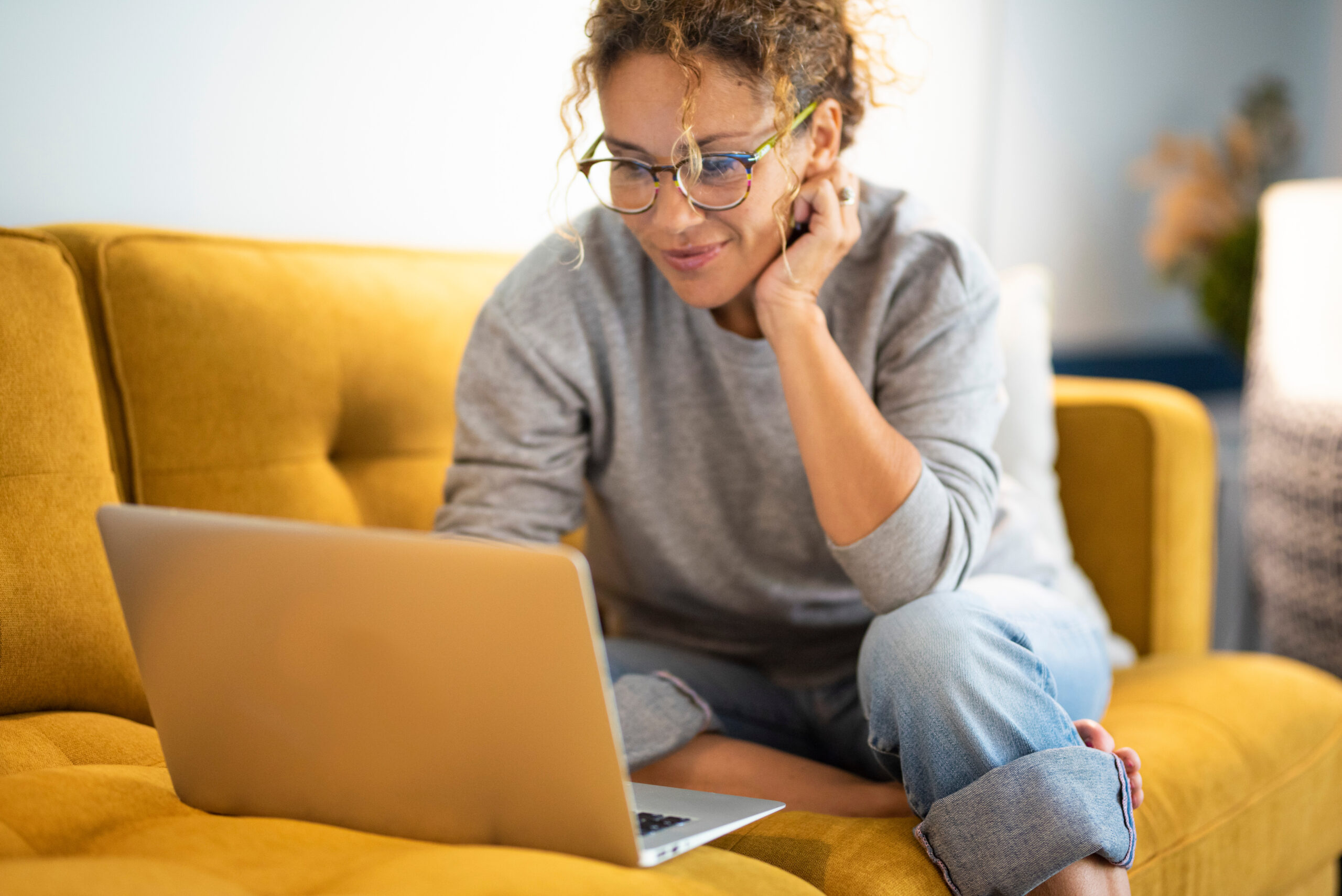 Woman writing on computer