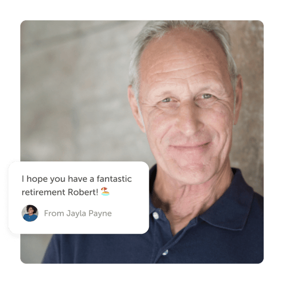 Older man smiling with "happy retirement" post