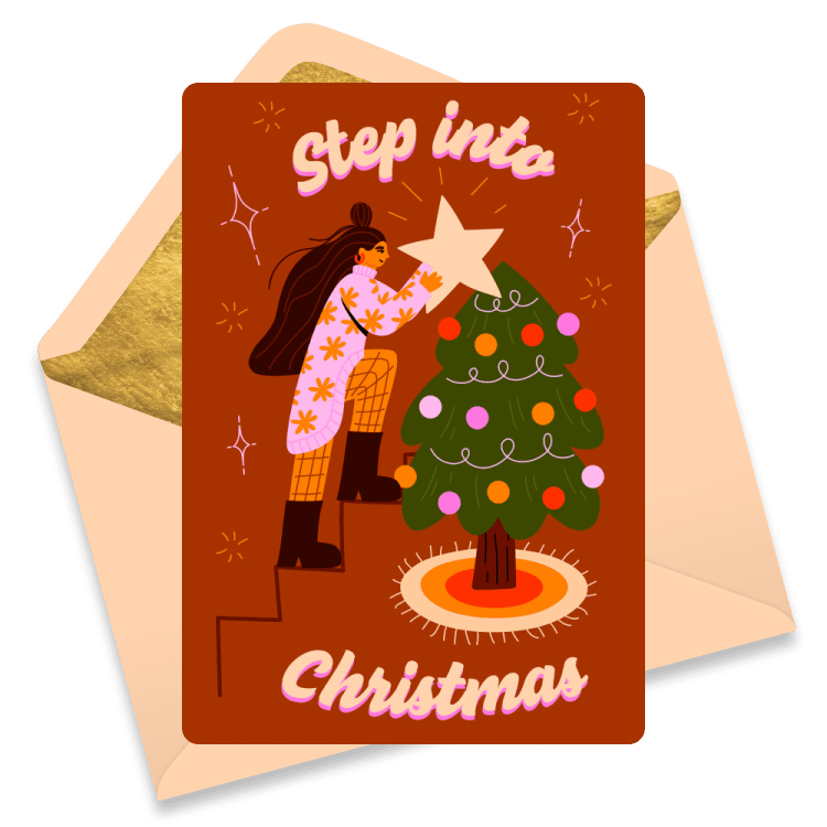 Christmas eCard with a person placing a star on top of a Christmas tree, with the words 'Step into Christmas'. Brown-orange background, beige envelope.