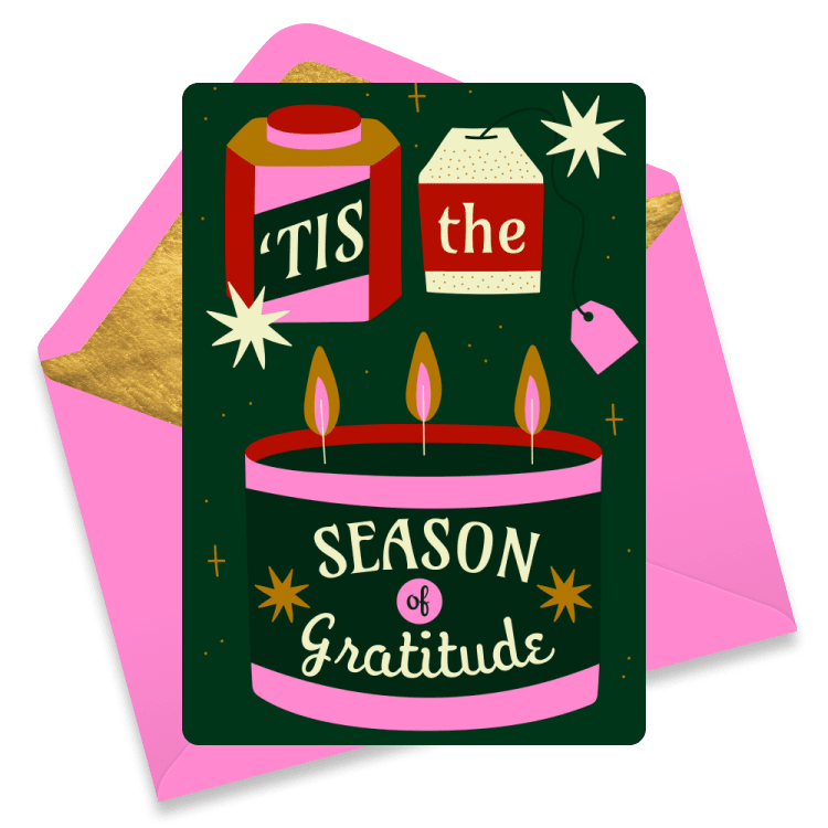 Christmas eCard with candle, tea bag, and the words 'Tis the Season of Gratitude'. Dark green background with pink accents and envelope.