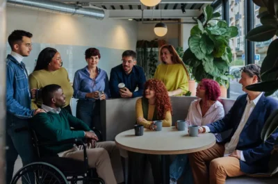 A diverse workforce meeting together.